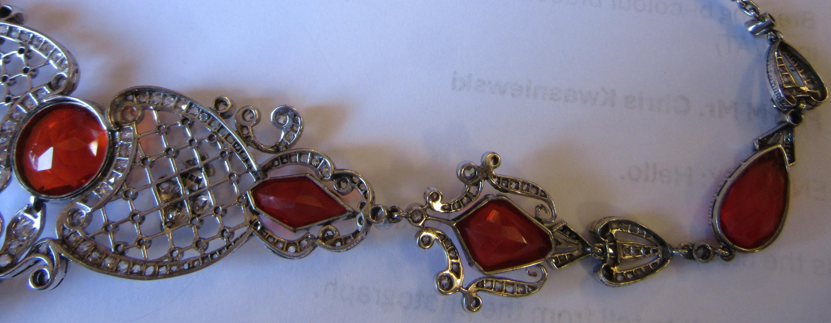 A FIRE OPAL AND DIAMOND NECKLACE BY W. PHILLIPS Image