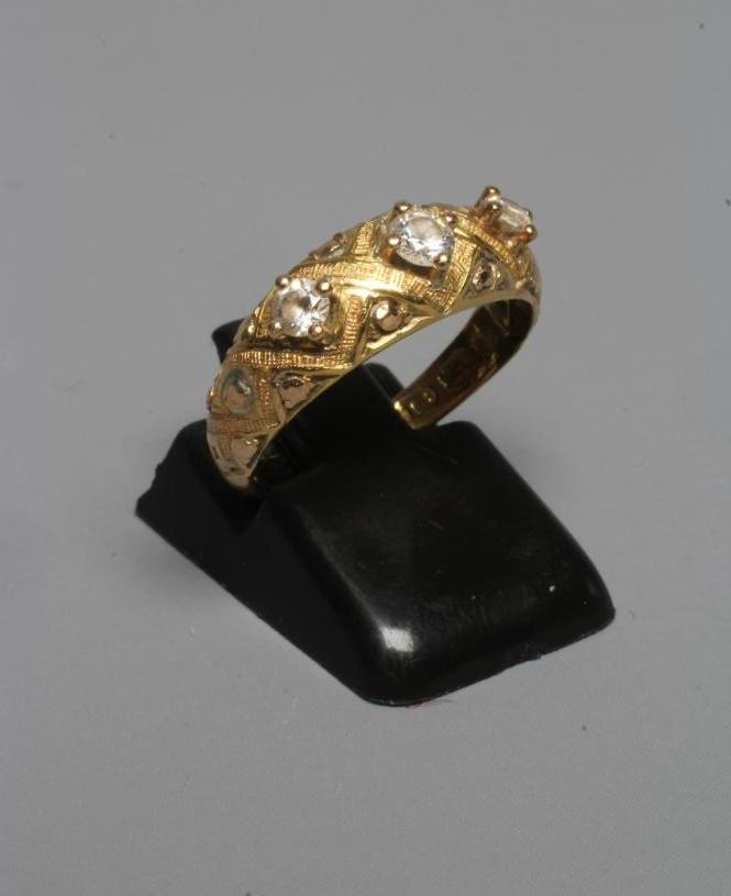 A MID VICTORIAN THREE STONE DIAMOND RING Image