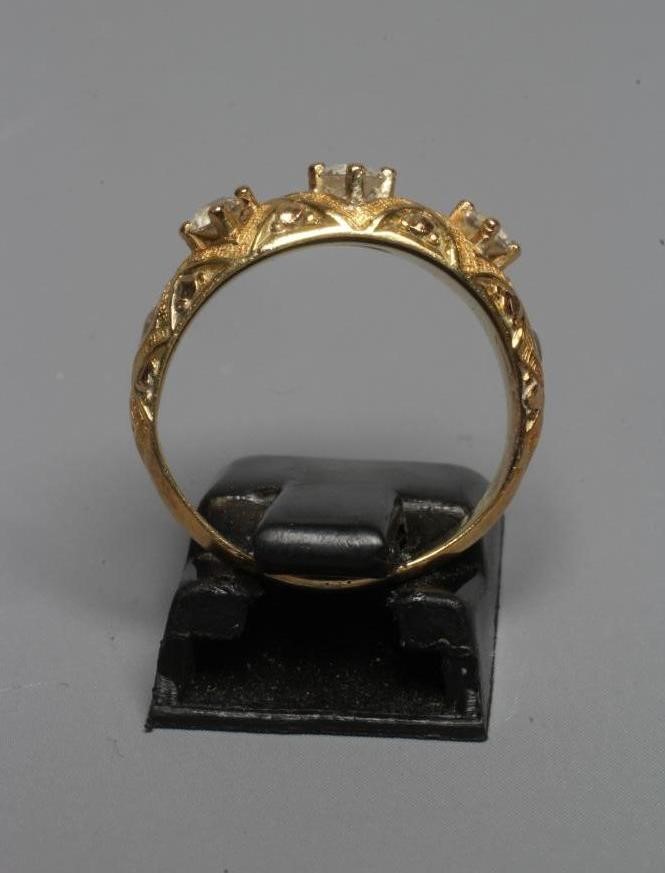 A MID VICTORIAN THREE STONE DIAMOND RING Image