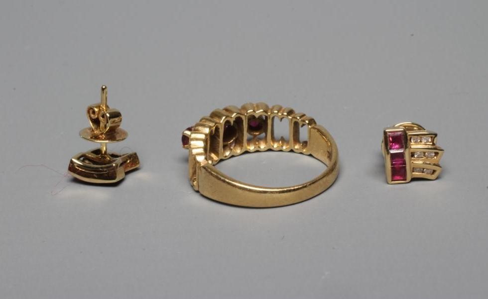 A THREE STONE RUBY RING Image