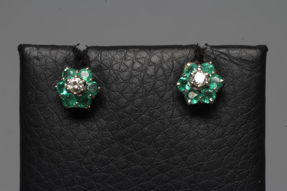 A PAIR OF EMERALD AND DIAMOND EAR STUDS Image