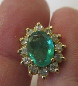 A PAIR OF EMERALD AND DIAMOND CLUSTER EAR STUDS Image