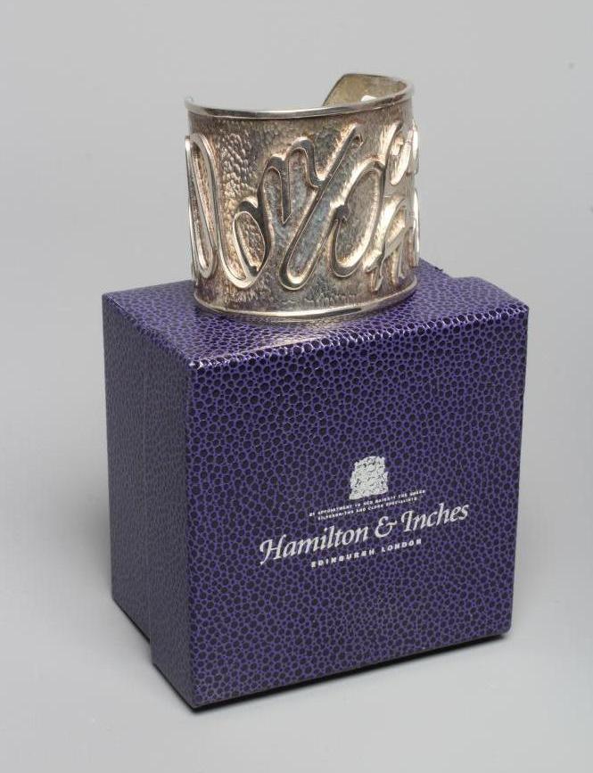 A MODERN WIDE SILVER CUFF by Hamilton & Inches Image