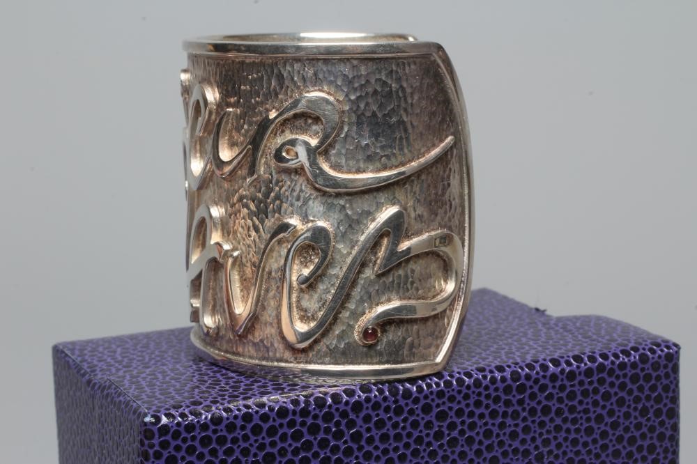 A MODERN WIDE SILVER CUFF by Hamilton & Inches Image