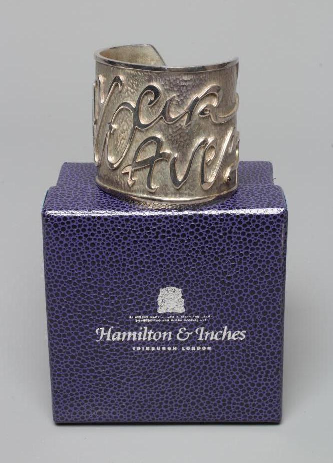 A MODERN WIDE SILVER CUFF by Hamilton & Inches Image