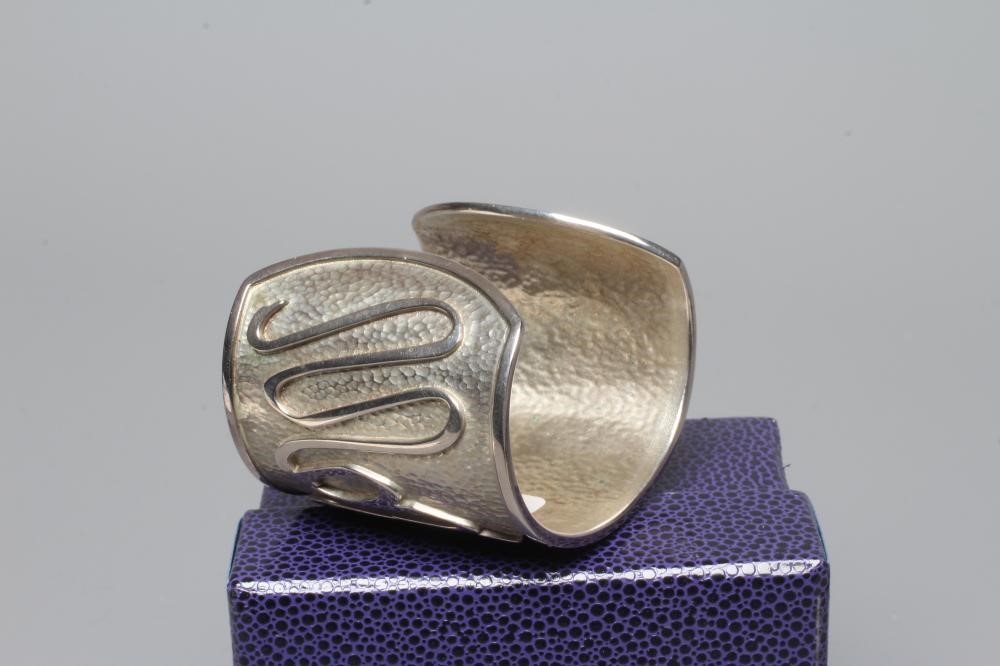 A MODERN WIDE SILVER CUFF by Hamilton & Inches Image
