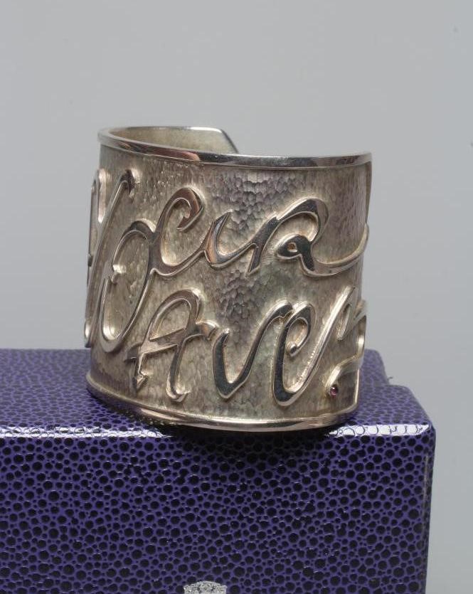 A MODERN WIDE SILVER CUFF by Hamilton & Inches Image