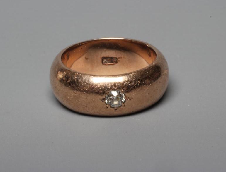 A GENTLEMAN'S SOLITAIRE DIAMOND RING, gypsy set with an old cut stone of approximately 0.20cts to a Image