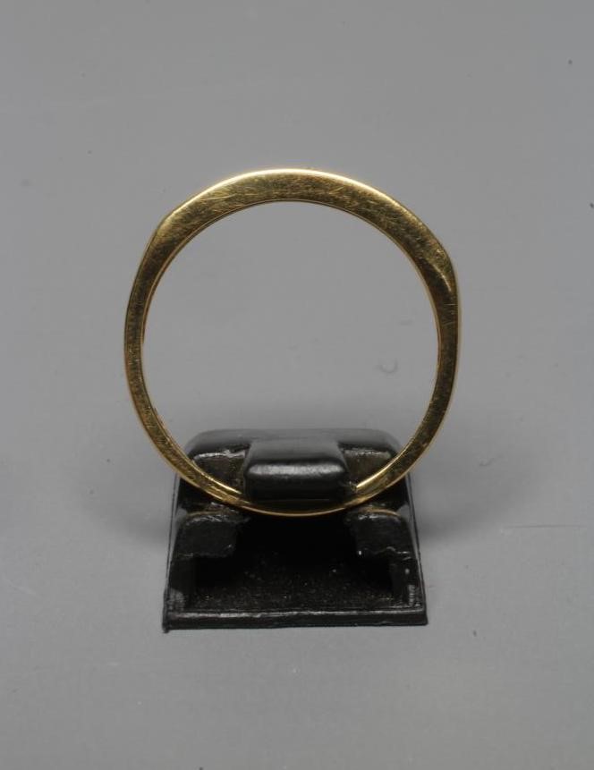 A SEVEN STONE DIAMOND HALF HOOP ETERNITY RING, the brilliant cut stones totalling 0.5cts, channel Image