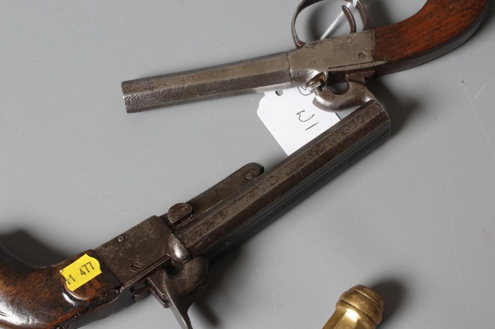 THREE ANTIQUE PISTOLS comprising a Belgian brass percussion pistol with octagonal barrel and etched Image