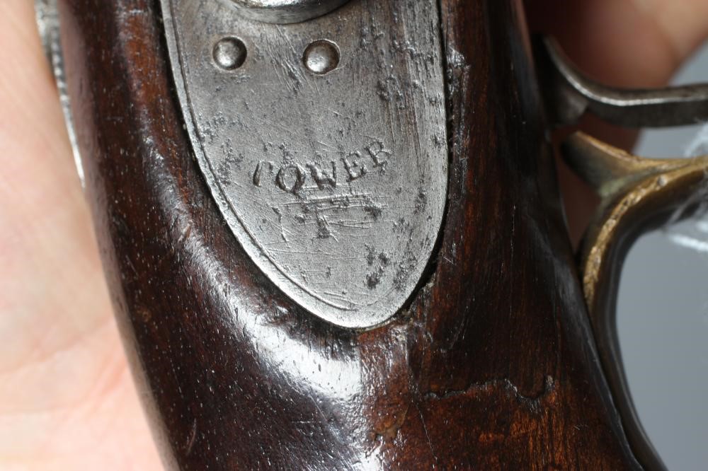 A PERCUSSION TOWER TYPE PISTOL with 9" barrel, brass furniture, walnut stock, steel belt loop and Image