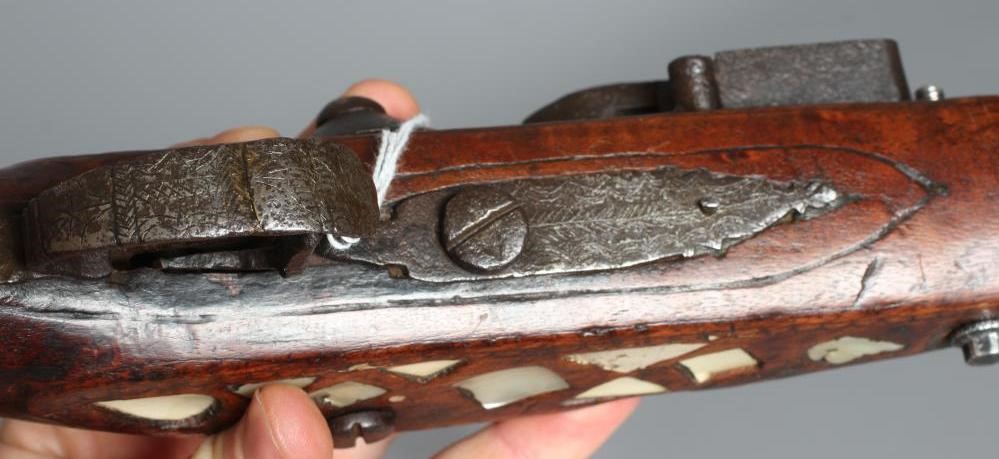 AN AFGHAN FLINTLOCK PISTOL with 11 1/4" ferrule decorated barrel Image