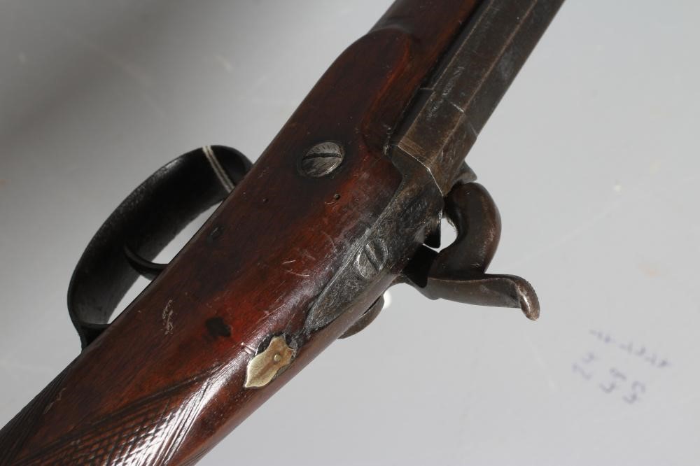 A PERCUSSION MUSKET, the 29 3/4" barrel octagonal at the breech, foliate etched action, steel Image