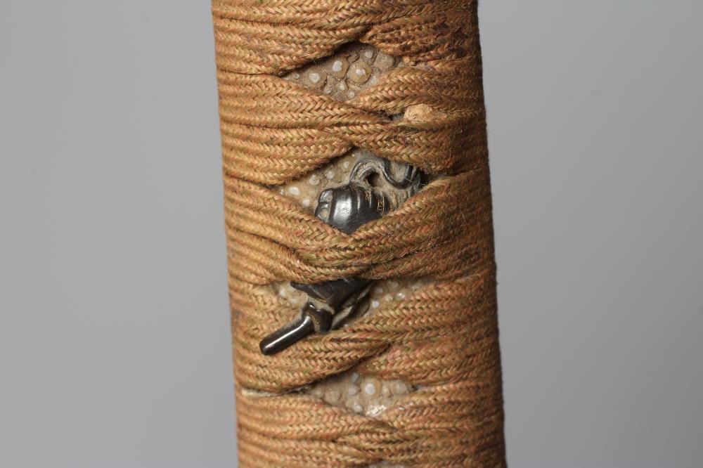 A JAPANESE KATANA, Edo period, with 24 3/4" curved blade, undulating hamon, unsigned tang with four Image