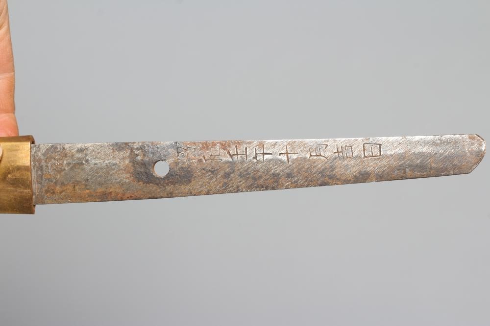 A JAPANESE KATANA with 26 1/4" curved blade, visible hamon, tang signed to both sides, WWII tsuba, Image