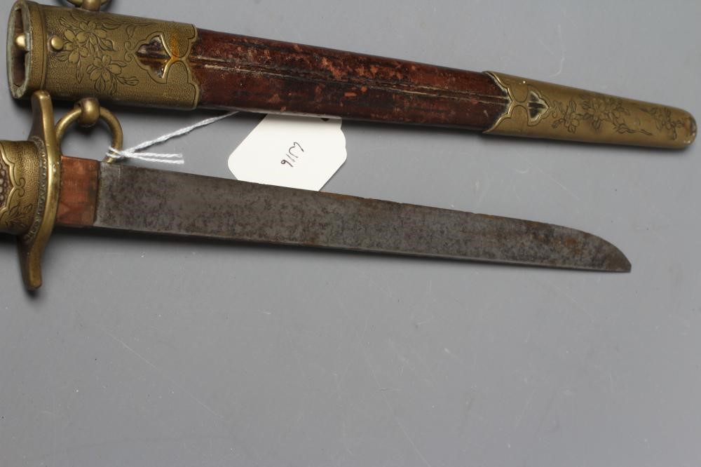 A JAPANESE NAVAL DIRK with 9 3/8" straight blade Image