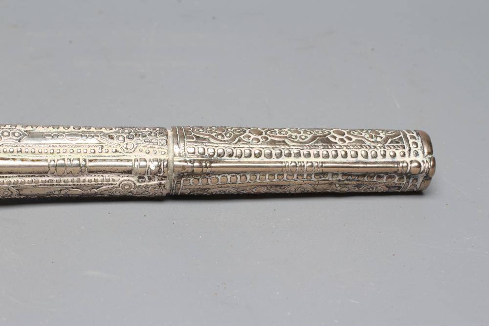 A TURKISH FLINTLOCK PISTOL, early 19th century, with 13 1/4" barrel, miquelet action, decorative Image