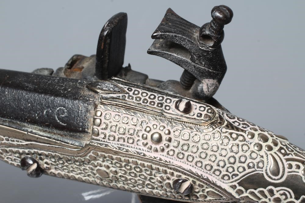 A TURKISH FLINTLOCK PISTOL, early 19th century, with 13 1/4" barrel, miquelet action, decorative Image