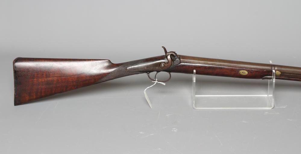 A PERCUSSION FOWLING GUN, the 32 1/4" barrel hexagonal at the breech, foliate etched action, walnut Image