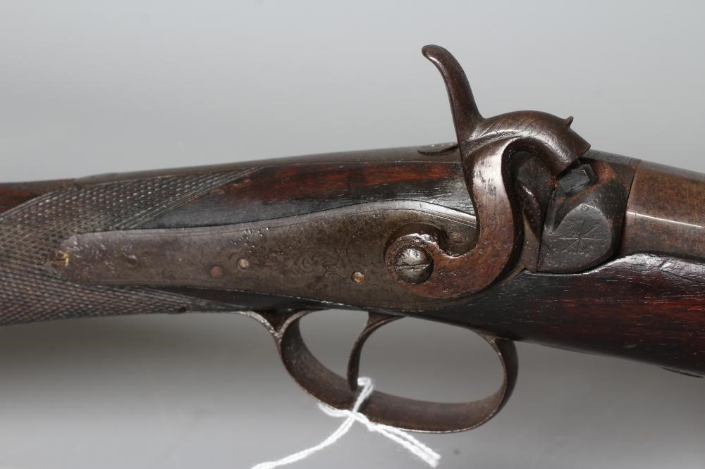 A PERCUSSION FOWLING GUN, the 32 1/4" barrel hexagonal at the breech, foliate etched action, walnut Image