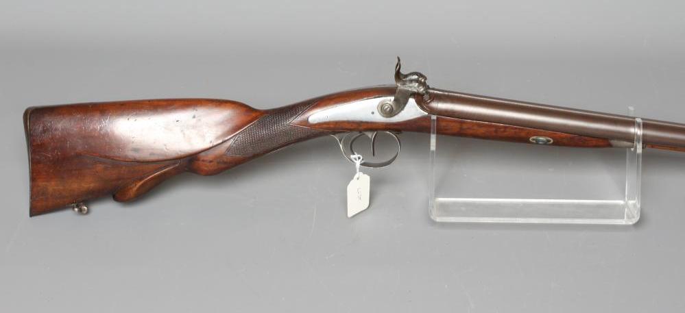 A PERCUSSION DOUBLE BARELLED RIFLE with 34 5/8" damascus barrels Image