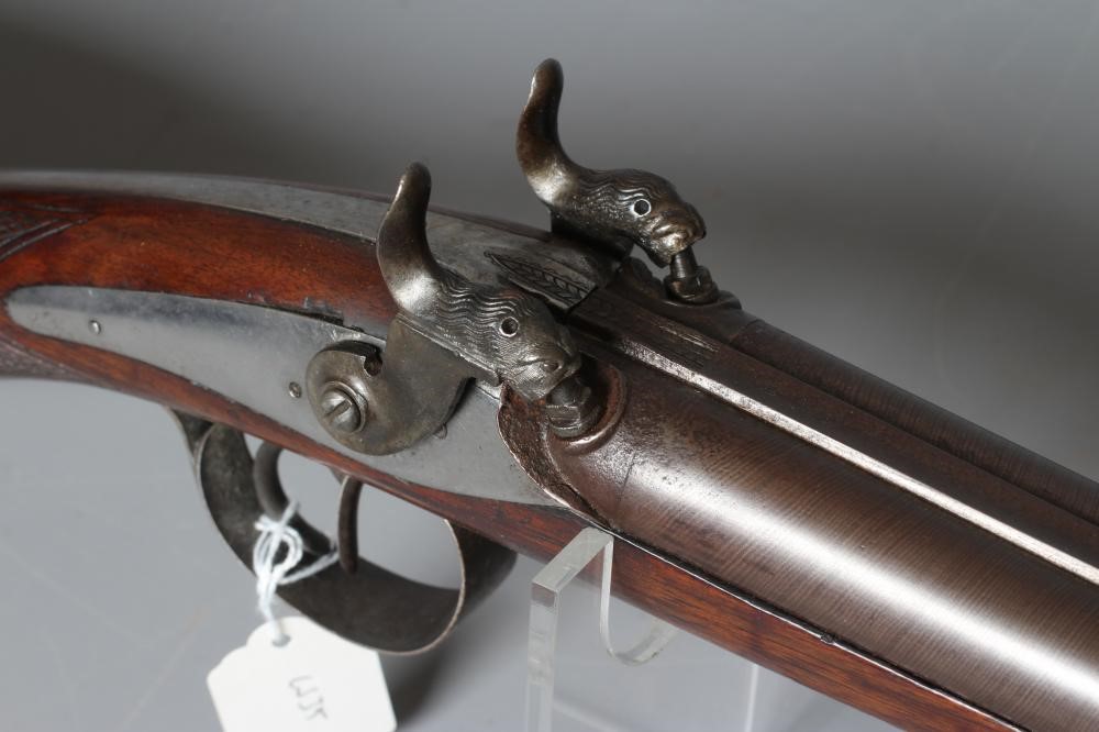 A PERCUSSION DOUBLE BARELLED RIFLE with 34 5/8" damascus barrels Image