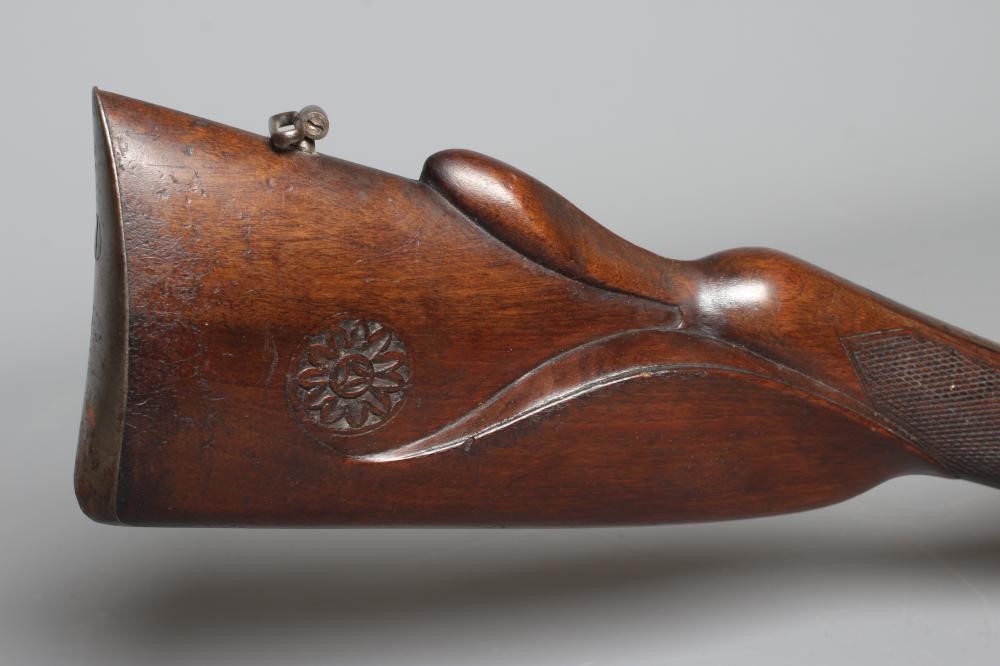 A PERCUSSION DOUBLE BARELLED RIFLE with 34 5/8" damascus barrels Image