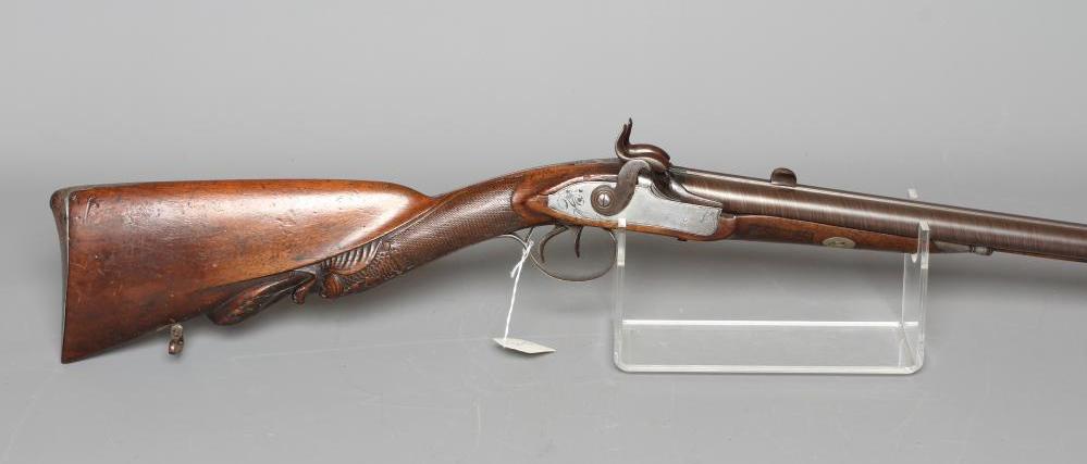 A PERCUSSION DOUBLE BARELLED RIFLE with 31 3/4" damascus barrels Image