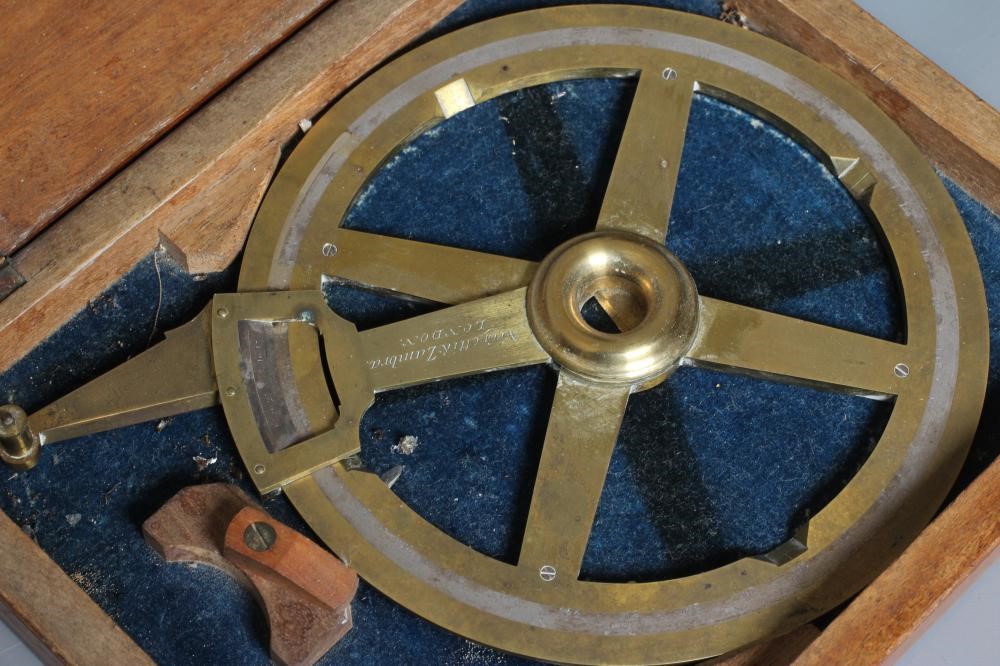 THREE ANTIQUE NAVIGATION TOOLS comprising an Elliott Brothers of London pocket sextant in integral Image