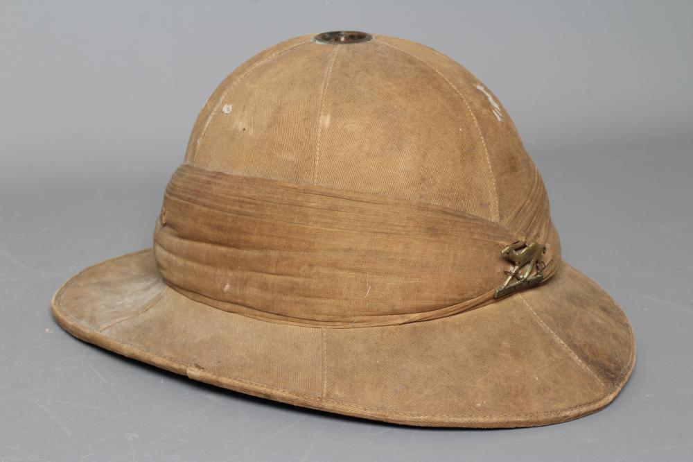 AN IMPERIAL CAMEL CORPS PITH HELMET with ICC badge, internal broad arrow stamp and inscribed to T. Image