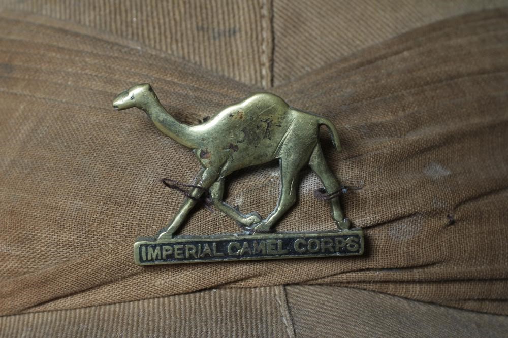 AN IMPERIAL CAMEL CORPS PITH HELMET with ICC badge, internal broad arrow stamp and inscribed to T. Image