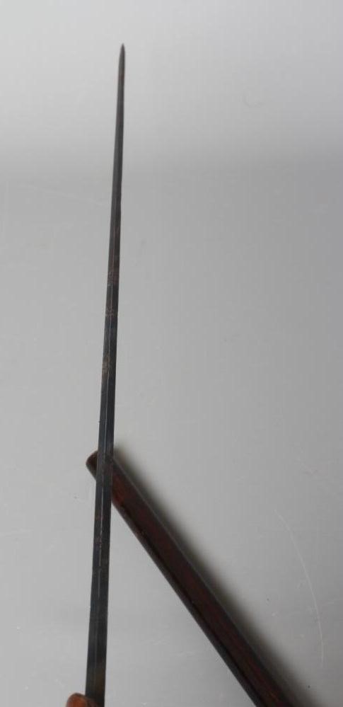 A SILVER MOUNTED SWORD STICK, Chester 1922, with 24 1/2" blued blade and buckle carved wood grip, 36 Image