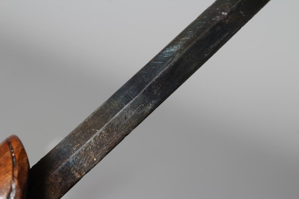 A SILVER MOUNTED SWORD STICK, Chester 1922, with 24 1/2" blued blade and buckle carved wood grip, 36 Image