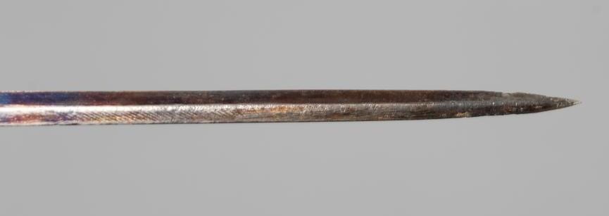 A SILVER MOUNTED SWORD STICK, Chester 1922, with 24 1/2" blued blade and buckle carved wood grip, 36 Image