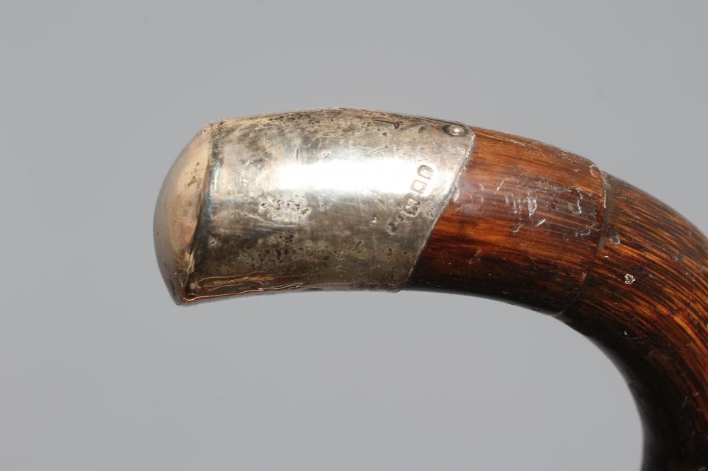 A SILVER MOUNTED SWORD STICK, London 1925, with 27 1/4" fullered blade, faux bamboo crook handle, Image