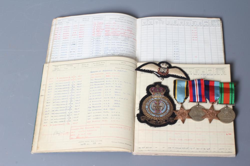 A FAMILY OF SECOND WORLD WAR MEDALS AND FLIGHT LOG BOOKS Image