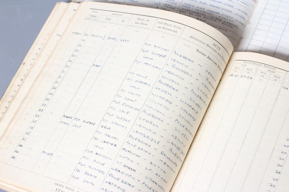 A FAMILY OF SECOND WORLD WAR MEDALS AND FLIGHT LOG BOOKS Image