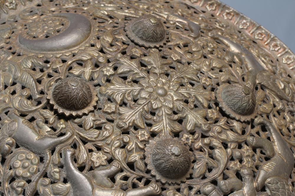 A CIRCULAR DHAL SHIELD decorated with a crescent moon Image