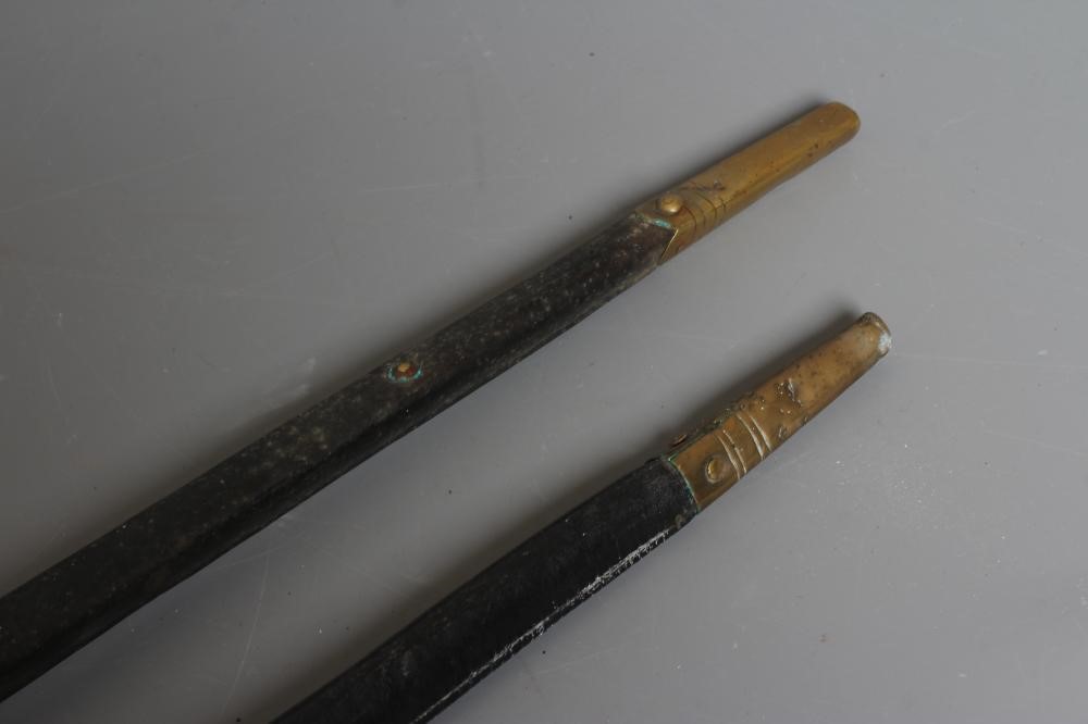TWO BRITISH PATTERN SOCKET BAYONETS, both with triangular section blades, brass and leather Image
