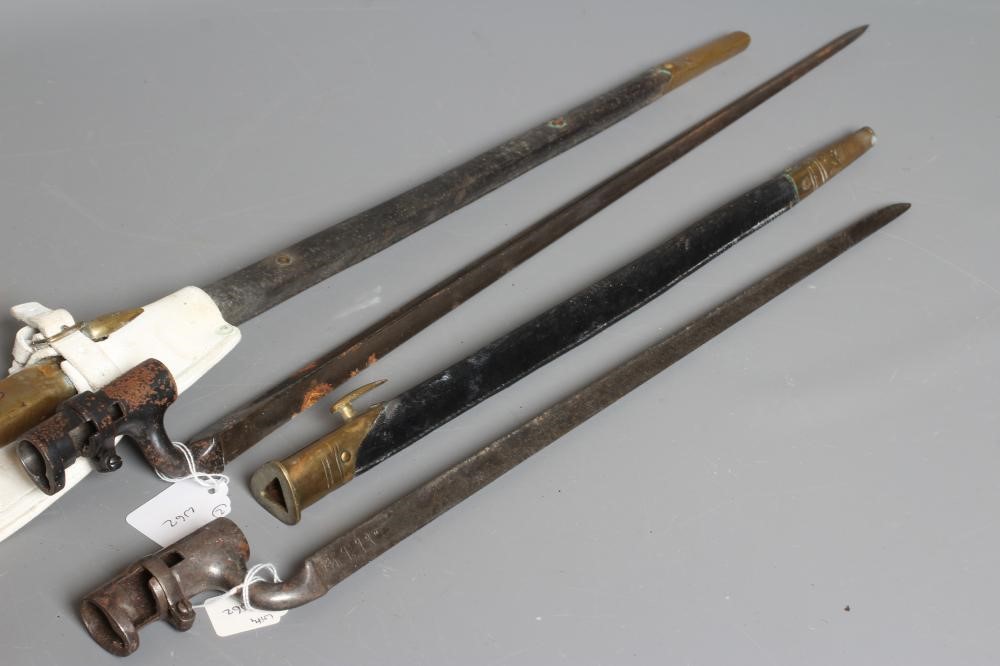 TWO BRITISH PATTERN SOCKET BAYONETS, both with triangular section blades, brass and leather Image