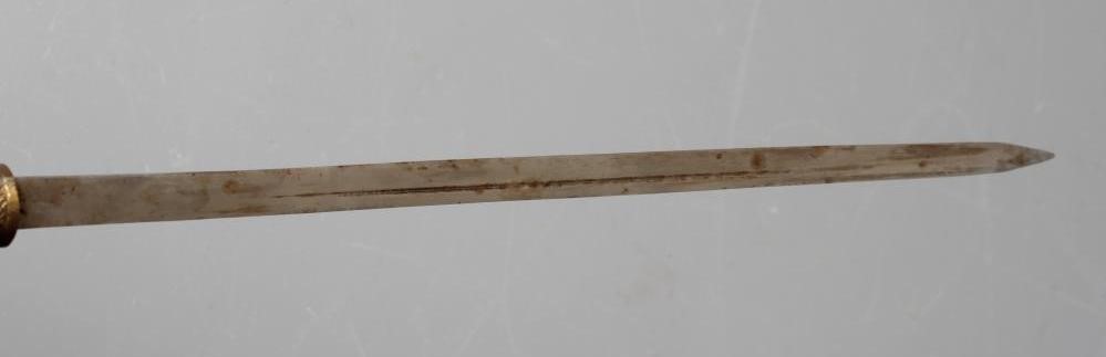 A SWAGGER SWORD STICK with 13 3/4" twist release ferrule, carved bone section to grip and lion Image