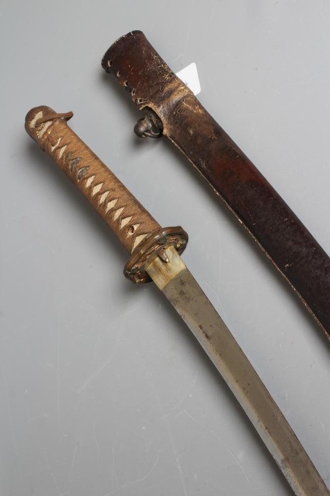 A JAPANESE KATANA with 24 1/2" curved blade, mildly undulating hamon, tang signed and painted, WWII Image