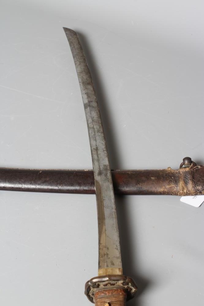 A JAPANESE KATANA with 24 1/2" curved blade, mildly undulating hamon, tang signed and painted, WWII Image