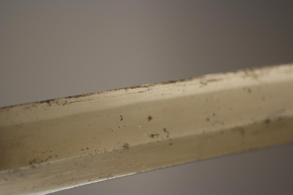 A JAPANESE KATANA with 24 1/2" curved blade, mildly undulating hamon, tang signed and painted, WWII Image