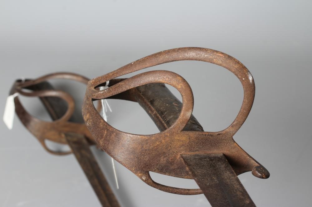TWO 1853 PATTERN CAVALRY TROOPER'S SWORDS both with approximately 35 1/2" blades, typical hilts and Image