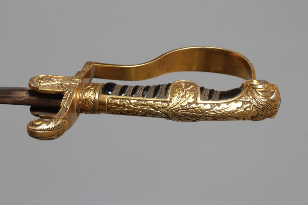 A GERMAN THIRD REICH ARMY OFFICER'S SWORD with 30 1/2" curved blade, hilt with reichsadlker langet, Image