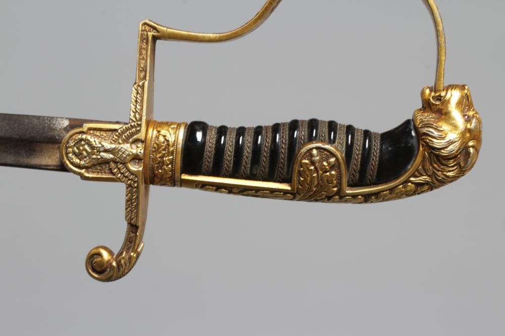 A GERMAN THIRD REICH ARMY OFFICER'S SWORD with 30 1/2" curved blade, hilt with reichsadlker langet, Image
