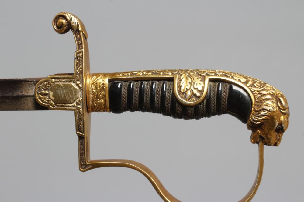 A GERMAN THIRD REICH ARMY OFFICER'S SWORD with 30 1/2" curved blade, hilt with reichsadlker langet, Image