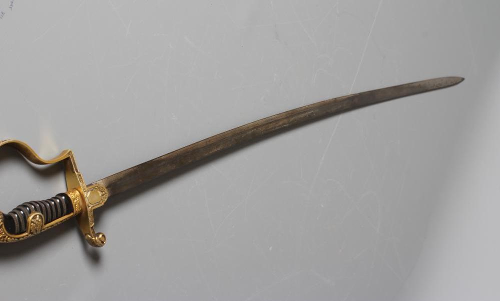 A GERMAN THIRD REICH ARMY OFFICER'S SWORD with 30 1/2" curved blade, hilt with reichsadlker langet, Image