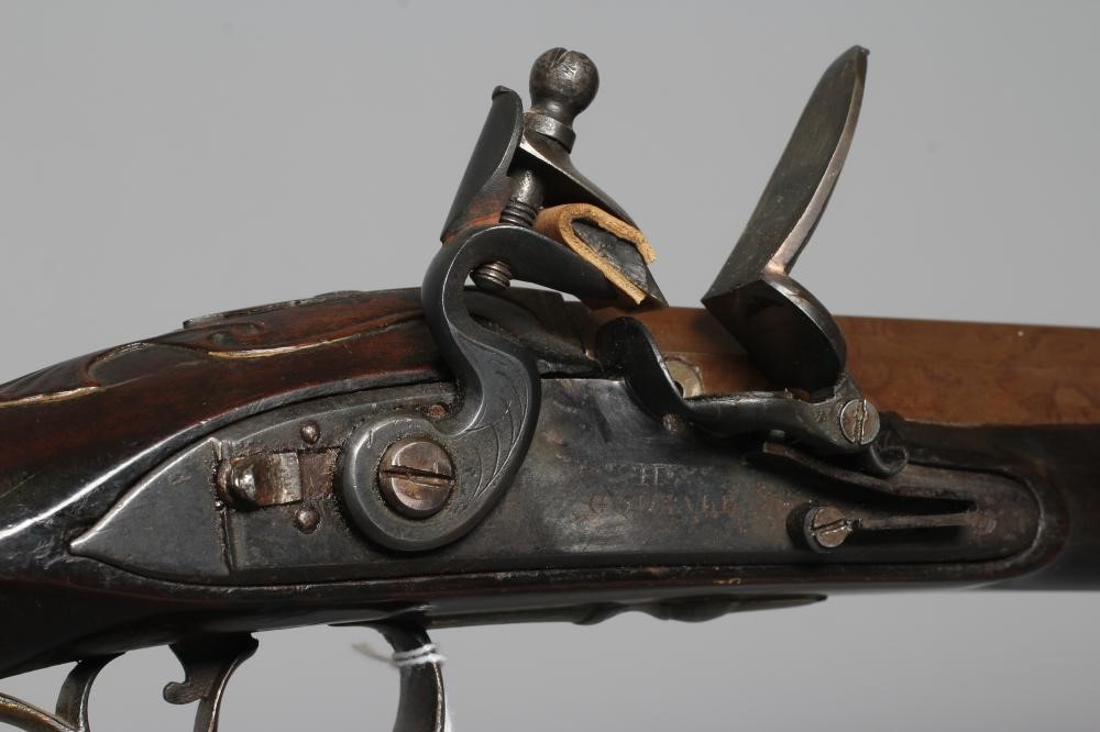 A FLINTLOCK SPORTING MUSKET BY H. GODSALL with 39" barrel octagonal at the breech Image